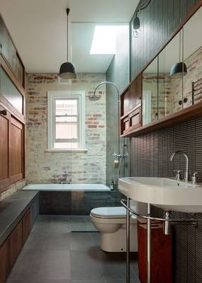 Design of bathroom in house in loft style.